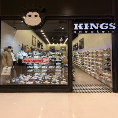 Logo da loja king sneakers