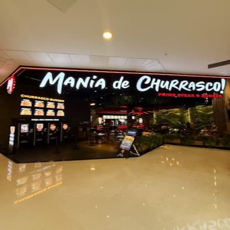 Logo da loja mania de churrasco